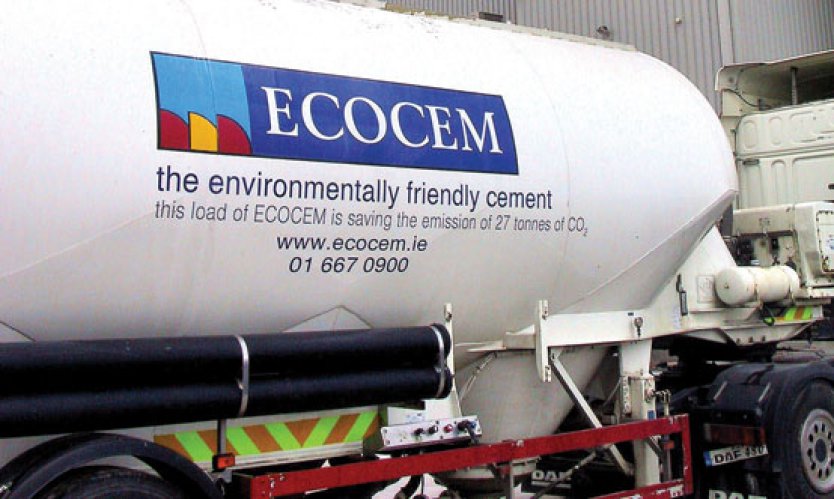 Ecocem-branded delivery truck; the slogan reads "this load of ECOCEM is saving the emissions of 27t of CO2."