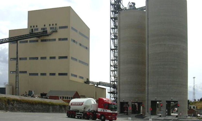 A bucket elevator for ground slag transport.